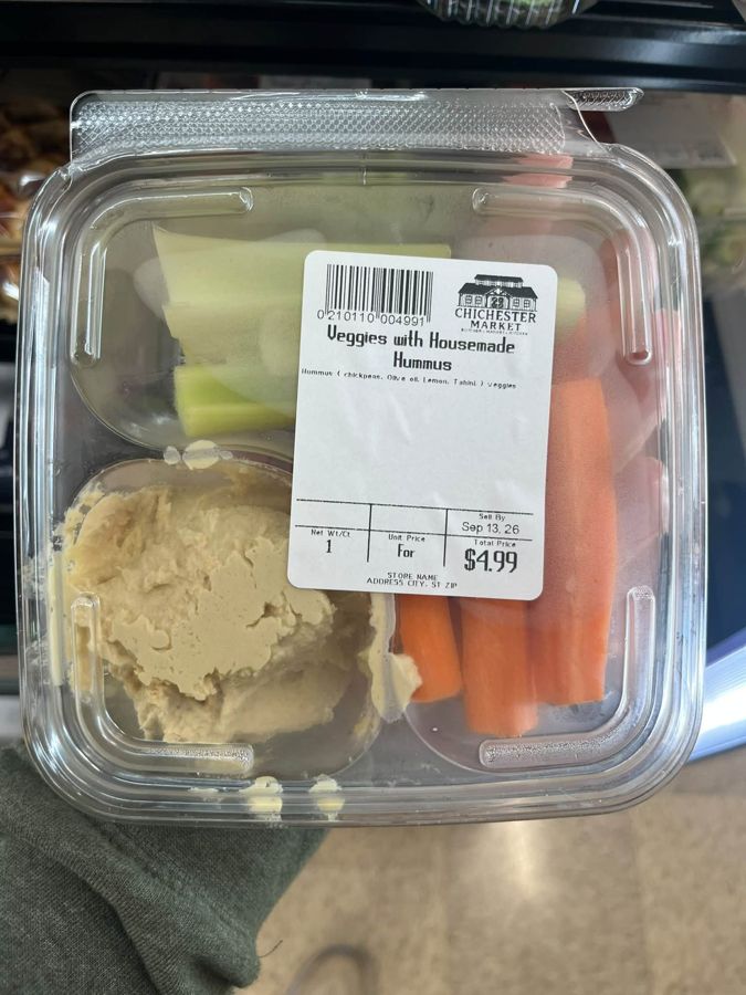Vegetables with house-made hummus in a takeaway container