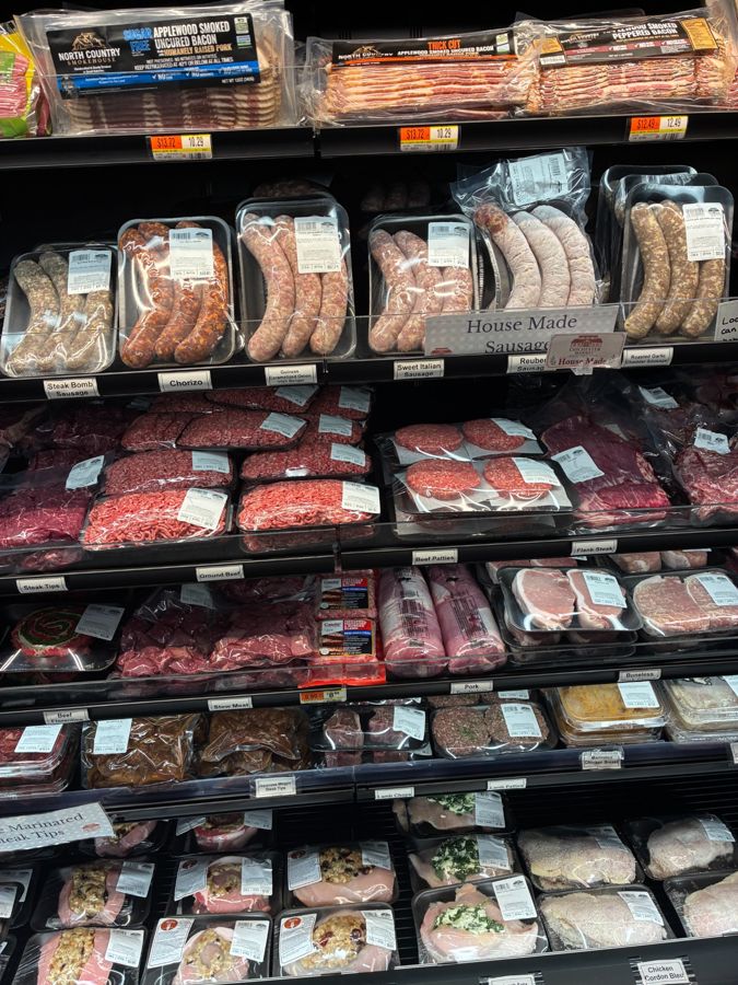 The butcher case with house-made sausages, burgers and stuffed meats