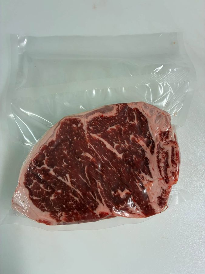A single steak sealed in a vacuum pouch