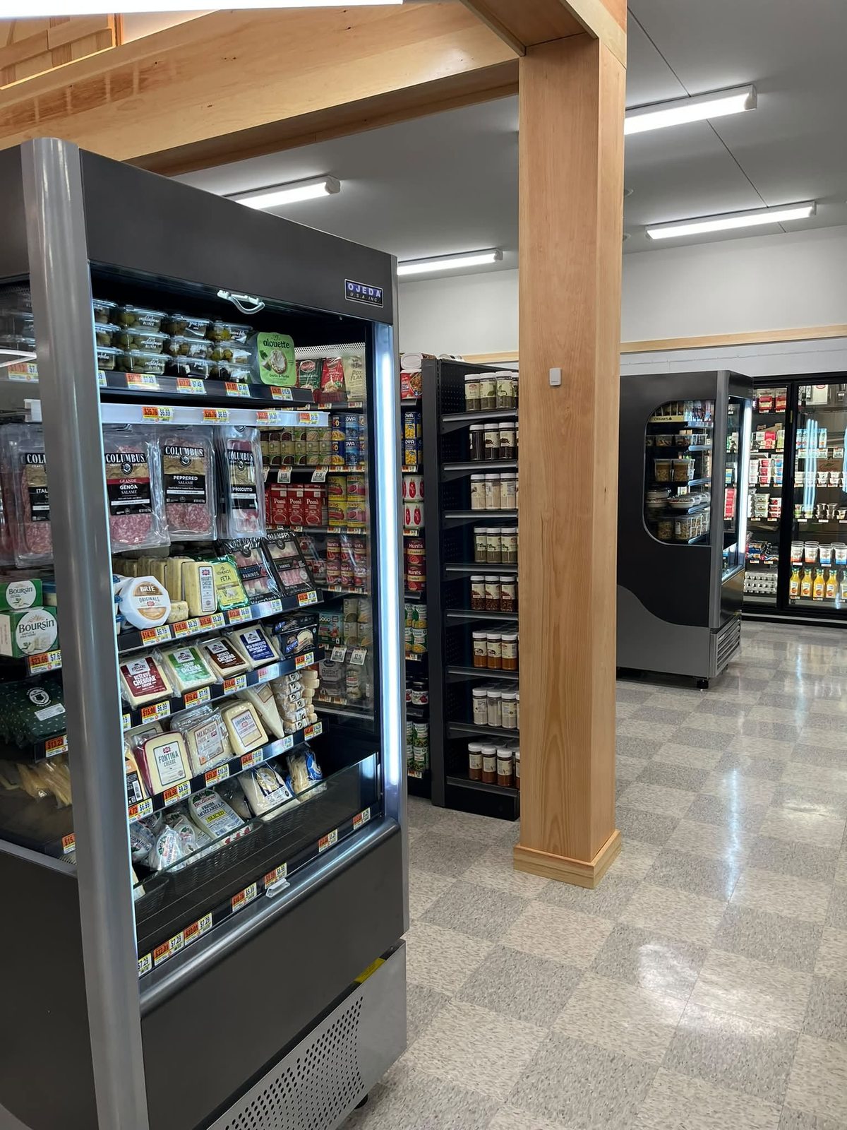 Cheese, charcuterie, and refrigerated specialty foods at Chichester Market